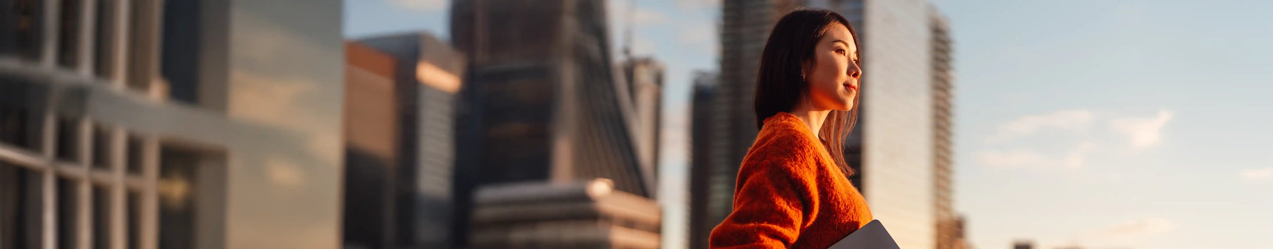 Woman in orange jumper
