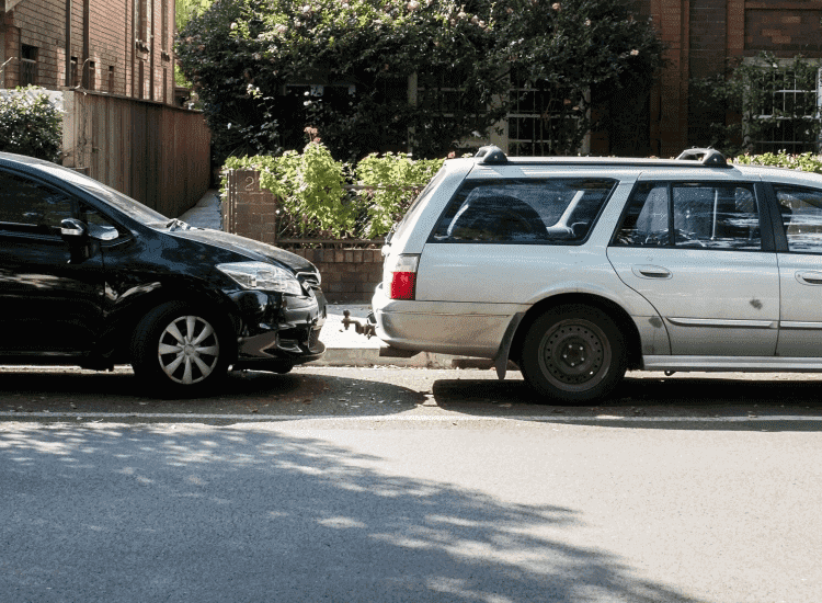 Comprehensive vs Third party insurance banner two cars parallel parked on curb of street