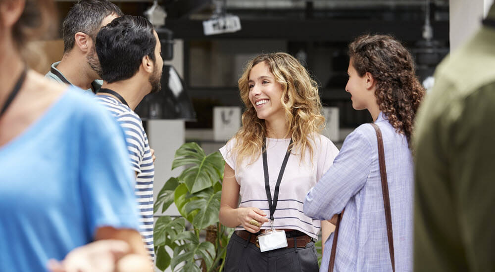 Smiling business team standing during meeting