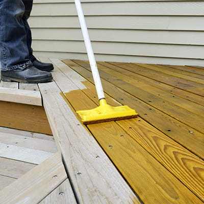 Home maintenance - painting deck