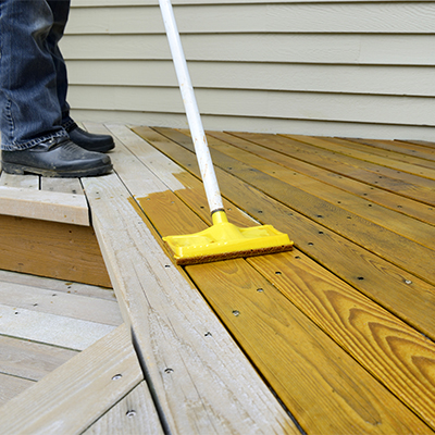 Home maintenance - painting deck