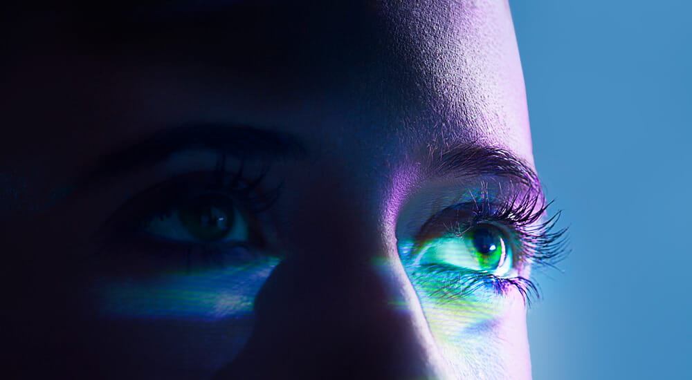 Behavioural Insights webinar -image of a face with the eye lit up with a green light