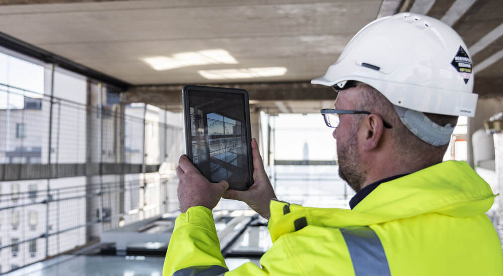 Architect using a tablet onsite