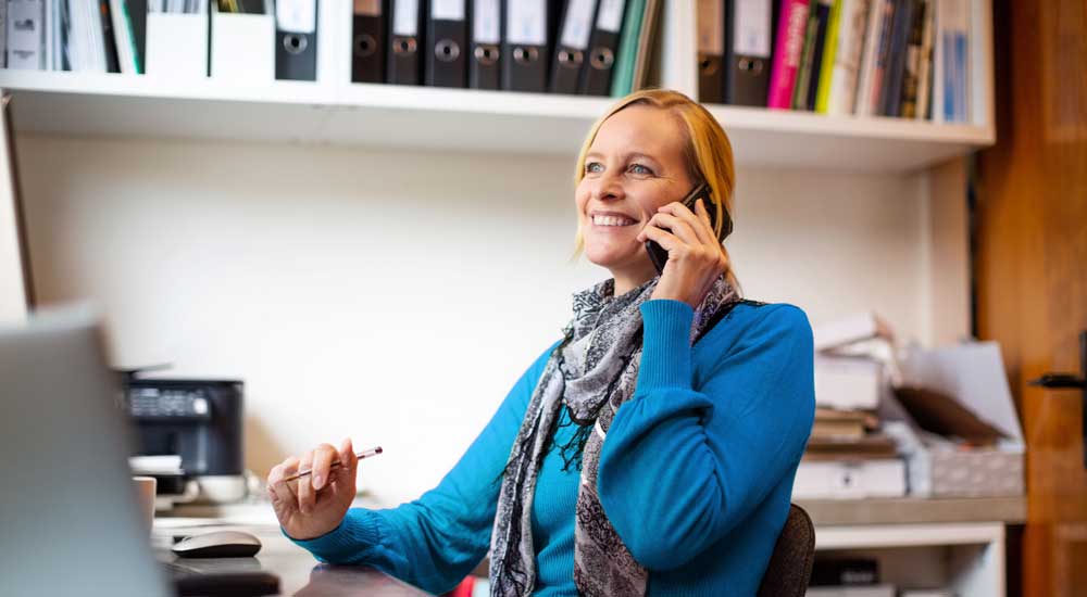 QBE Leadership webinar series: Conscious leadership - woman on phone