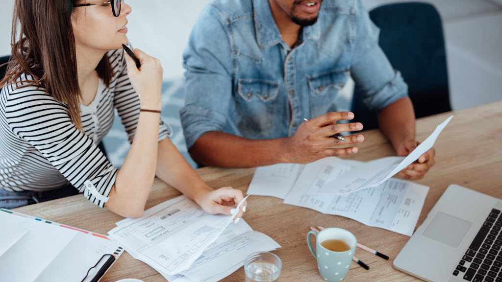 Financial hardship - couple discussing finances