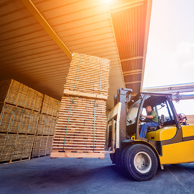 Man operating forklift