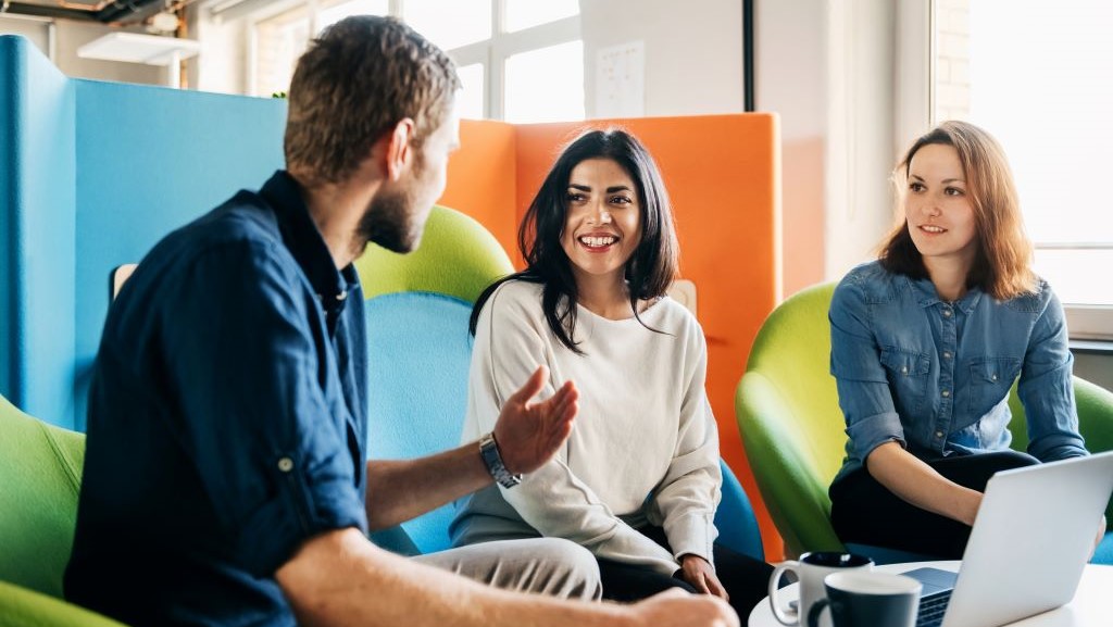 Group of young professionals meeting together