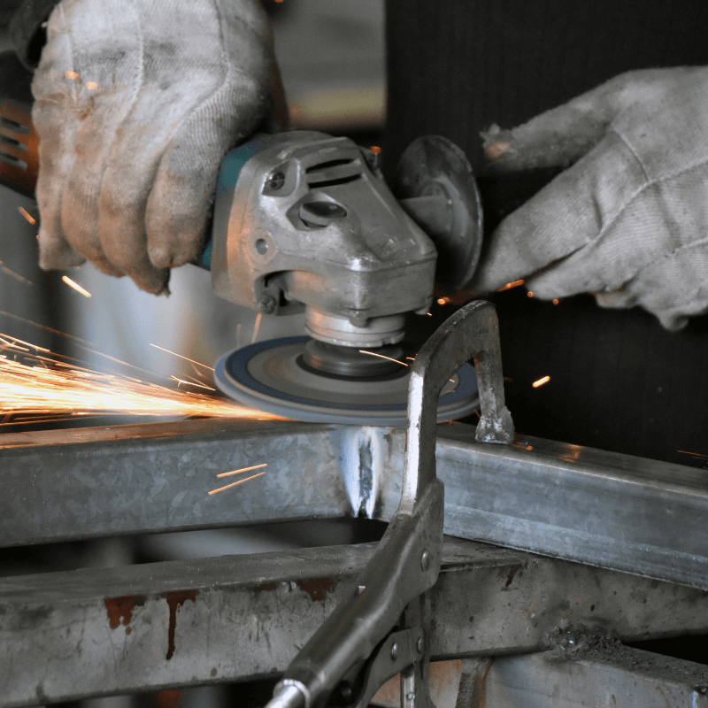 Hot Works Permit -industrial worker with metal work tool