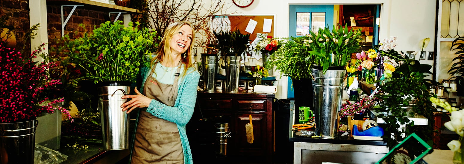 Small business female retail worker at florist