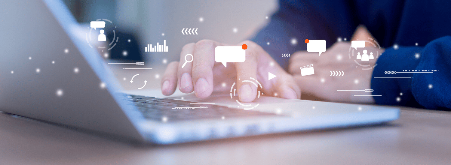 Hands on a keyboard with speech bubbles floating through the image