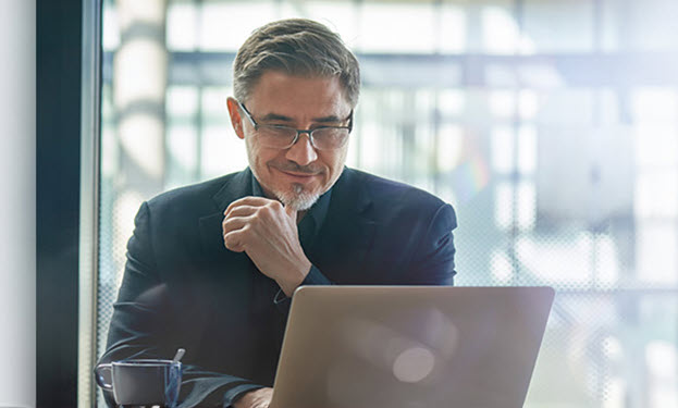 Man sitting at his laptop