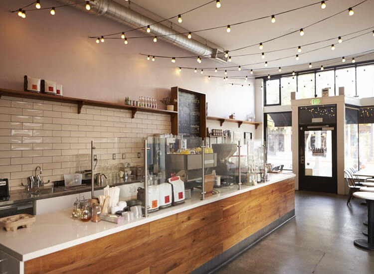 Empty cafe interior showing the counter and seating
