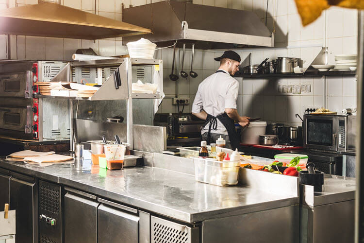 Chef cooking in the restaurant's kitchen