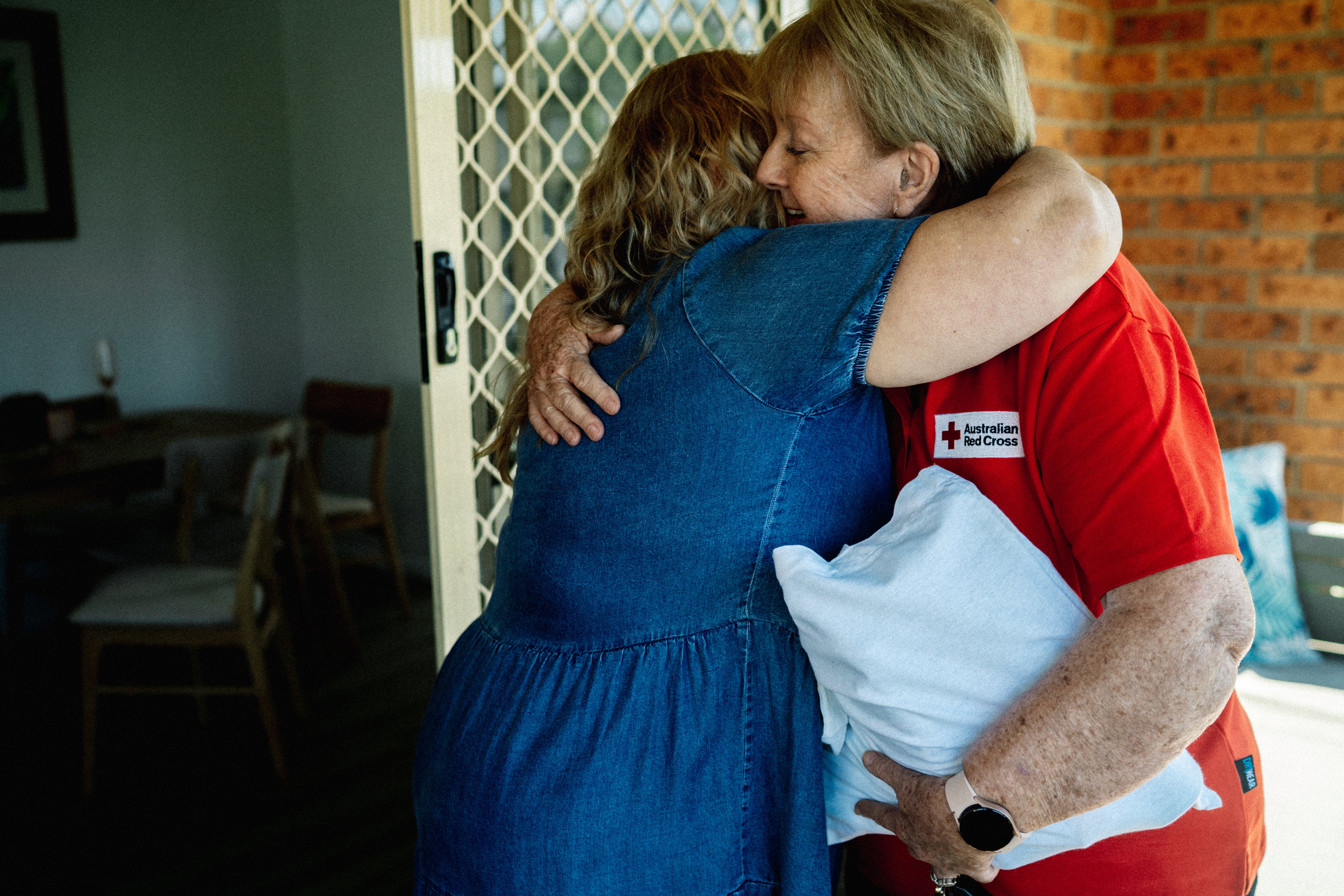 Two women embracing
