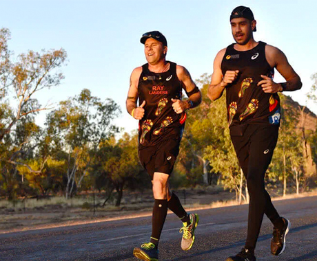 Two male runners taking part in the Indigenous Marathon Project