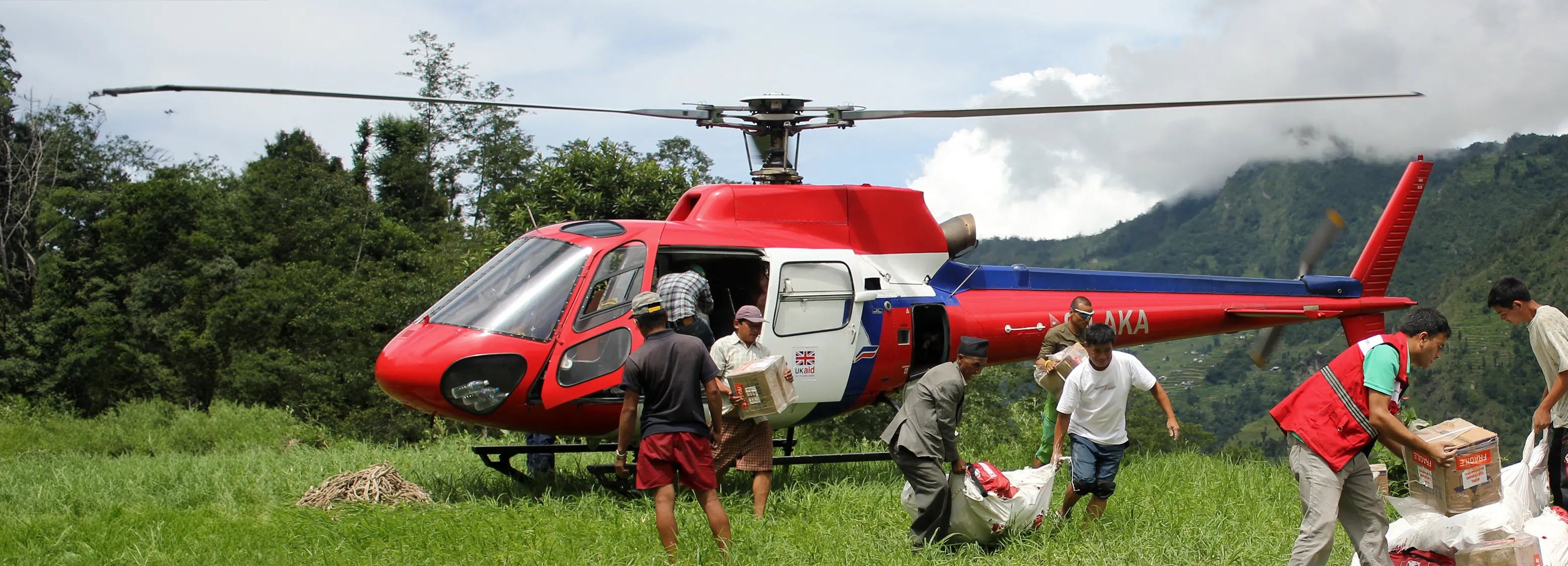 Red Cross helicopter bringing support in response to catastrophic disaster
