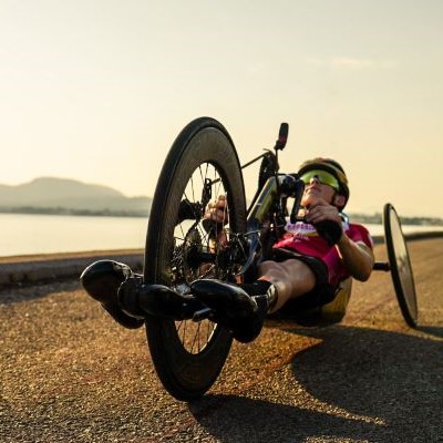 Australian triathlete Lauren Parker at edge of outdoor swimming pool