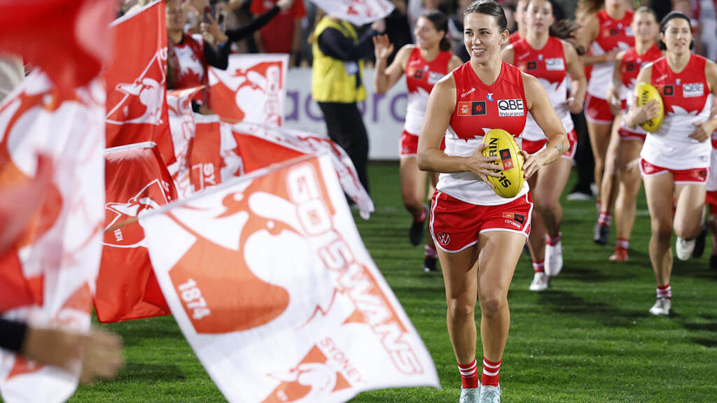 AFWL Sydney Swans team running on to the field