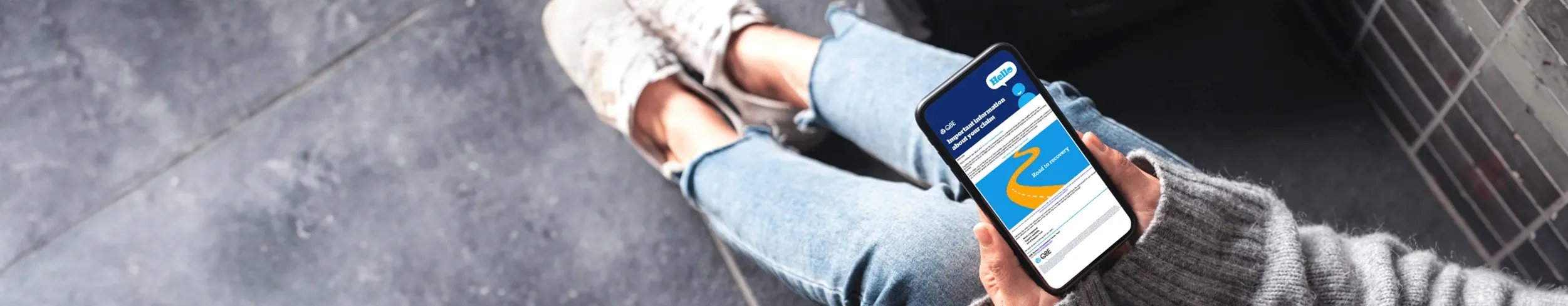 Injured person viewing their personalised My Recovery video on their smartphone