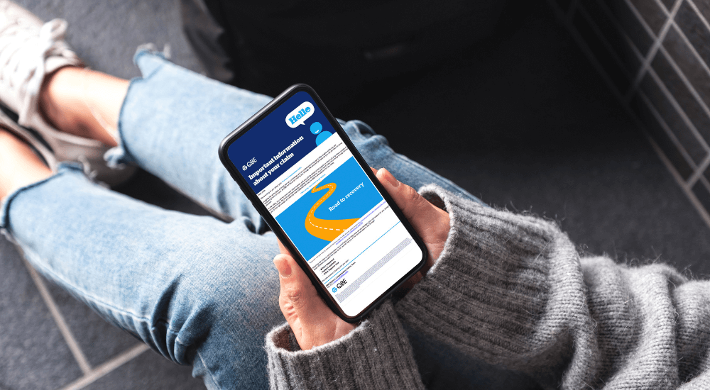 Injured person viewing their personalised My Recovery video on their smartphone