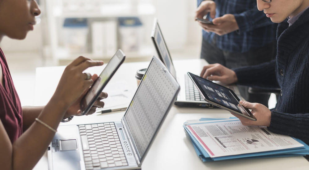 Business people using technology in office