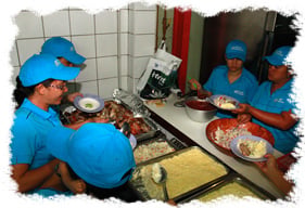 Volunteers serving food