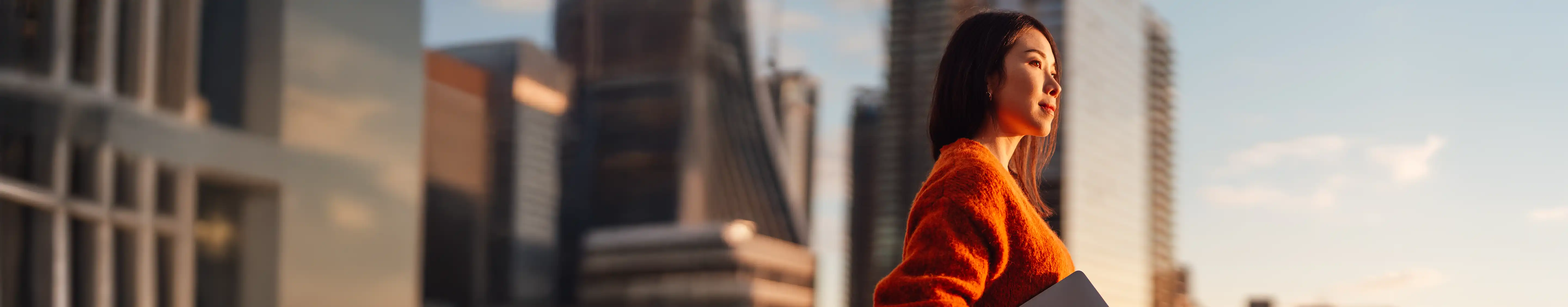 Woman in orange jumper