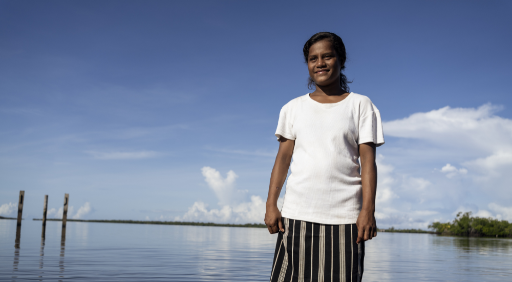 woman standing in a lake