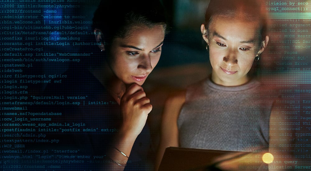2 women looking at a computer