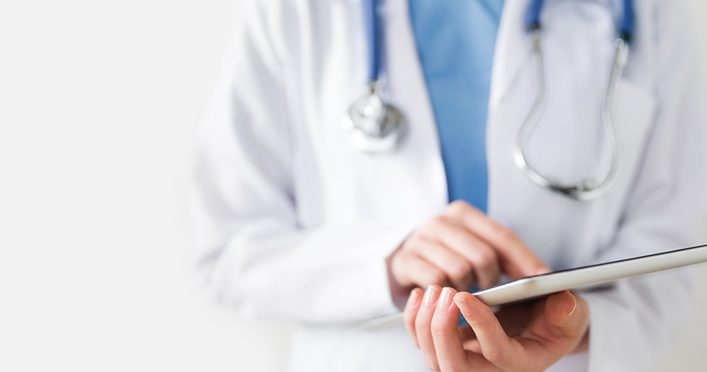 doctor on tablet