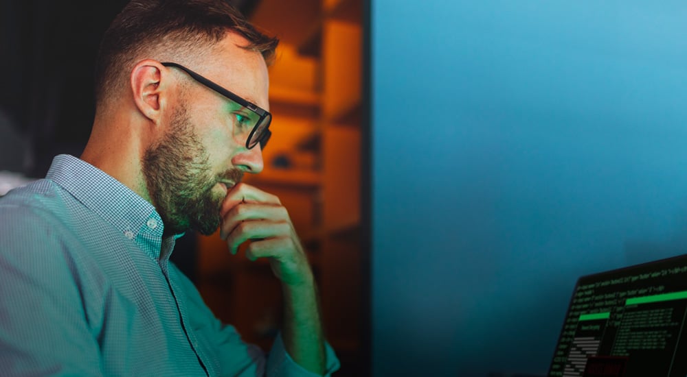 Man looking at a computer