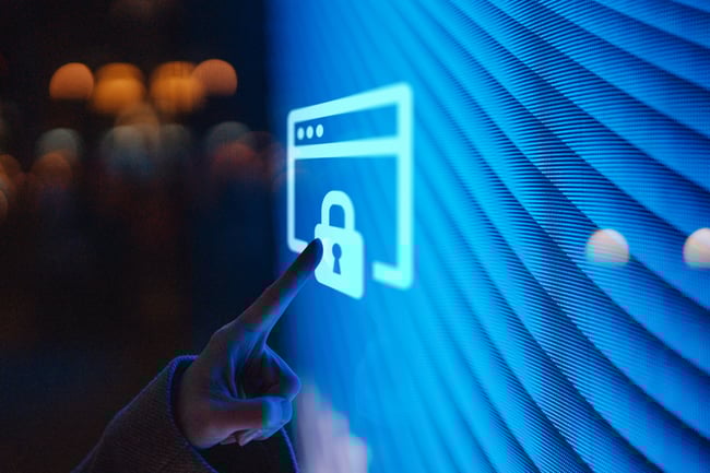 a hand pointing to a lock icon - cyber security